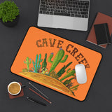 Cave Creek AZ desk mat - 12 x18 inch in orange