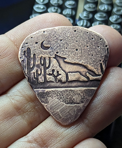Coyote copper guitar pick