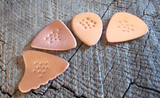 non slip copper guitar picks in 4 different shapes