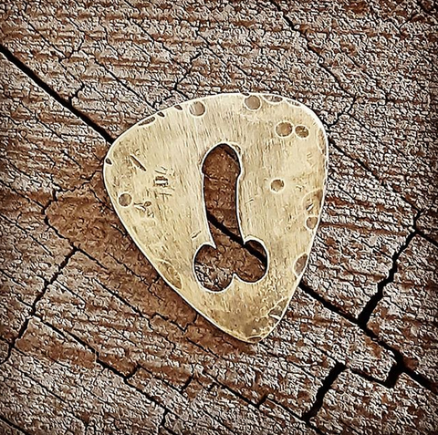 handmade brass dick pick with distressed finish