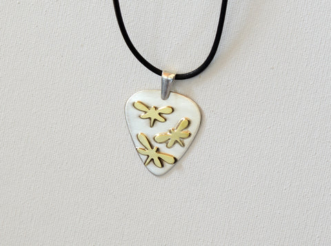 Dragonfly Artisan Sterling Silver Guitar Pick Necklace as a Fusion of Visual Art and Music