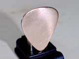 Guitar Pick Handmade from Copper and Ready for Your Personal Touches