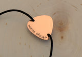 Copper guitar pick leather wrap bracelet stamped with Wanna Pluck