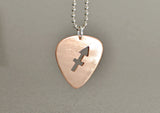 Copper guitar pick necklace with zodiac sign