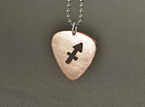 Copper guitar pick necklace with zodiac sign