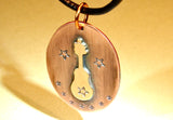 Bronze guitar necklace handmade for the hall of fame on copper