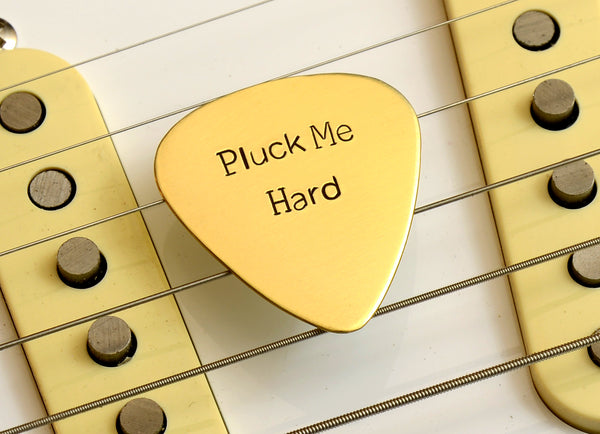Pluck me hard bronze guitar pick for the serious musician