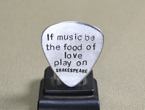 Shakespearian aluminum guitar pick