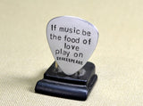 Shakespearian aluminum guitar pick
