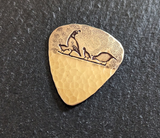 Desert quail bronze guitar pick with hammered texture