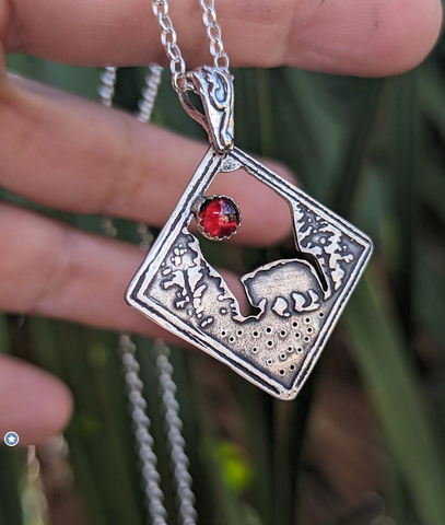 sterling silver bear charm necklace with garnet - bear in forest setting