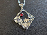 sterling silver bear charm necklace with garnet - bear in forest setting