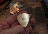 bronze guitar pick - dick pick --- yes I went there