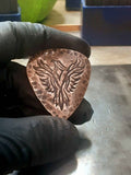 copper guitar pick with Phoenix
