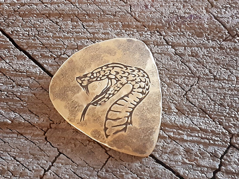 brass guitar pick - playable with snake head