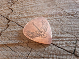 copper guitar pick with winged guitar - playable