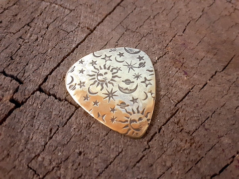 brass guitar pick - playable with sun moon and stars - collectible