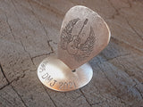 bronze memorial guitar pick with stand