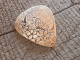 bronze guitar pick - playable with butterfly and moon