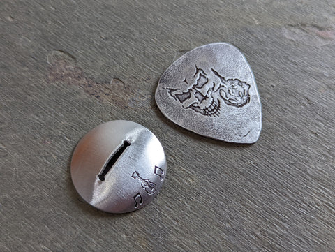 sterling silver guitar pick -with stand and skull with flipping bird