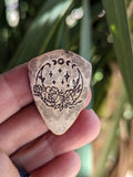 bronze shield shape with crystal moon phases - collectible pick - playable