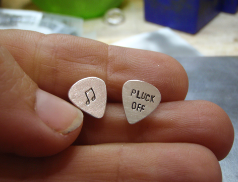 sterling silver stud earrings in guitar pick shape