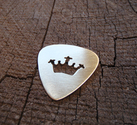 handmade bronze guitar pick with crown cut out