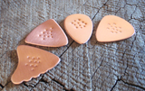 non slip copper guitar picks in 4 different shapes