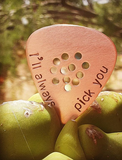 copper guitar pick with holes for improved grip
