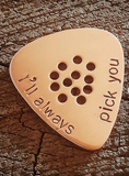 copper guitar pick with holes for improved grip