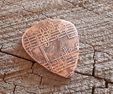 handmade and playable copper pick with music notes