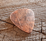 handmade and playable copper pick with music notes