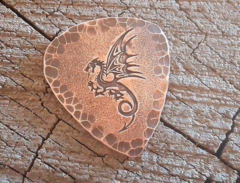 copper guitar pick with dragon - playable
