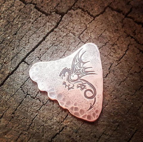 copper guitar pick - playable with dragon