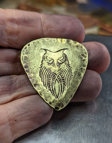 brass guitar pick with owl - playable