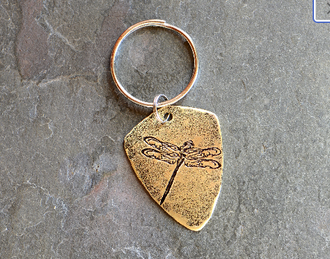 bronze shield guitar pick key ring with dragonfly