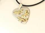 Dragonfly Artisan Sterling Silver Guitar Pick Necklace as a Fusion of Visual Art and Music