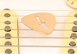Guitar Pick rocking out a Guitar Cut Out in Bronze