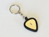 Music clef brass guitar pick keychain in Silicon Holder