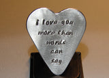 heart shaped guitar pick in sterling silver