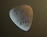 Sterling Guitar Pick Handmade with Rock Star and Skull Stamps