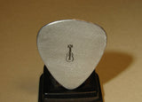sterling silver guitar pick with guitar stamp