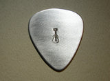 sterling silver guitar pick with guitar stamp