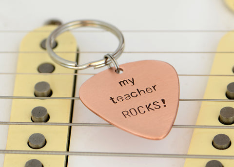 My teacher rocks guitar pick keychain in copper