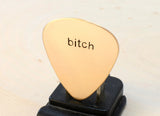 Bitch Guitar Pick in Bronze for a Riot Girl