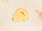 Bitch Guitar Pick in Bronze for a Riot Girl