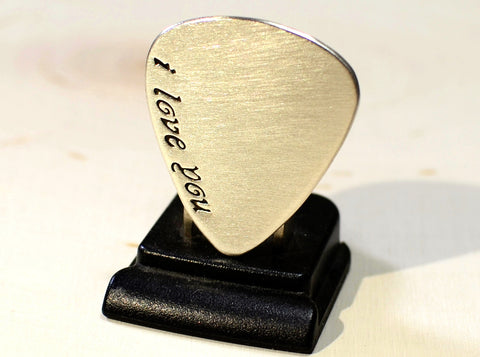 Sterling silver guitar pick with a fancy I love you for Valentines Day