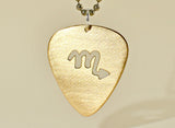 14K gold guitar pick necklace with cut out Zodiac symbol