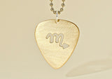 14K gold guitar pick necklace with cut out Zodiac symbol