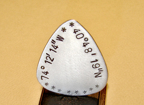 Latitude longitude guitar pick handmade in aluminum and personalized with coordinates